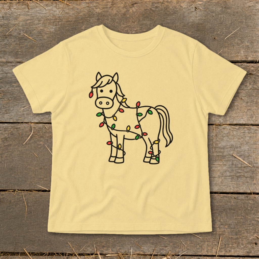 Light yellow t-shirt with a cartoon horse wrapped in colorful Christmas lights.