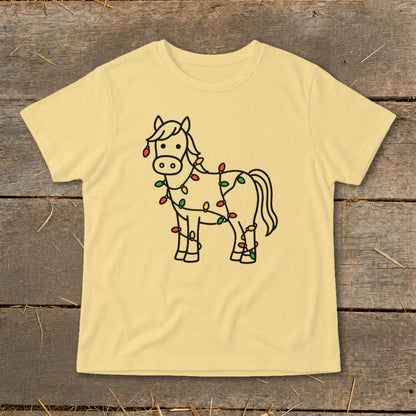 Light yellow t-shirt with a cartoon horse wrapped in colorful Christmas lights.