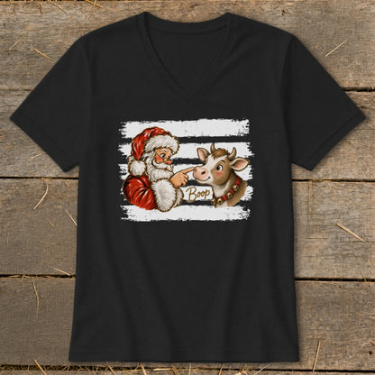 Santa "booping" a cow on the nose with the word "Boop" written on the image.