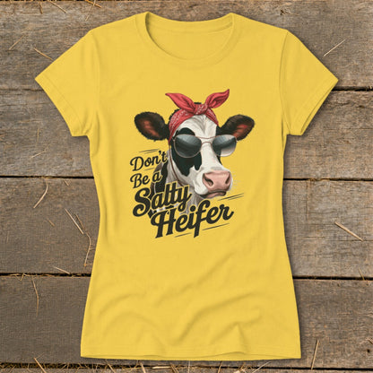 Yellow t-shirt with a cow wearing sunglasses and bandana, with text "Don't Be a Salty Heifer".
