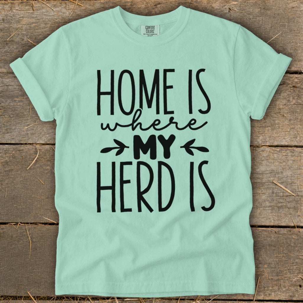 Mint green t-shirt with black text "HOME IS where MY HERD IS".