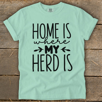 Mint green t-shirt with black text "HOME IS where MY HERD IS".