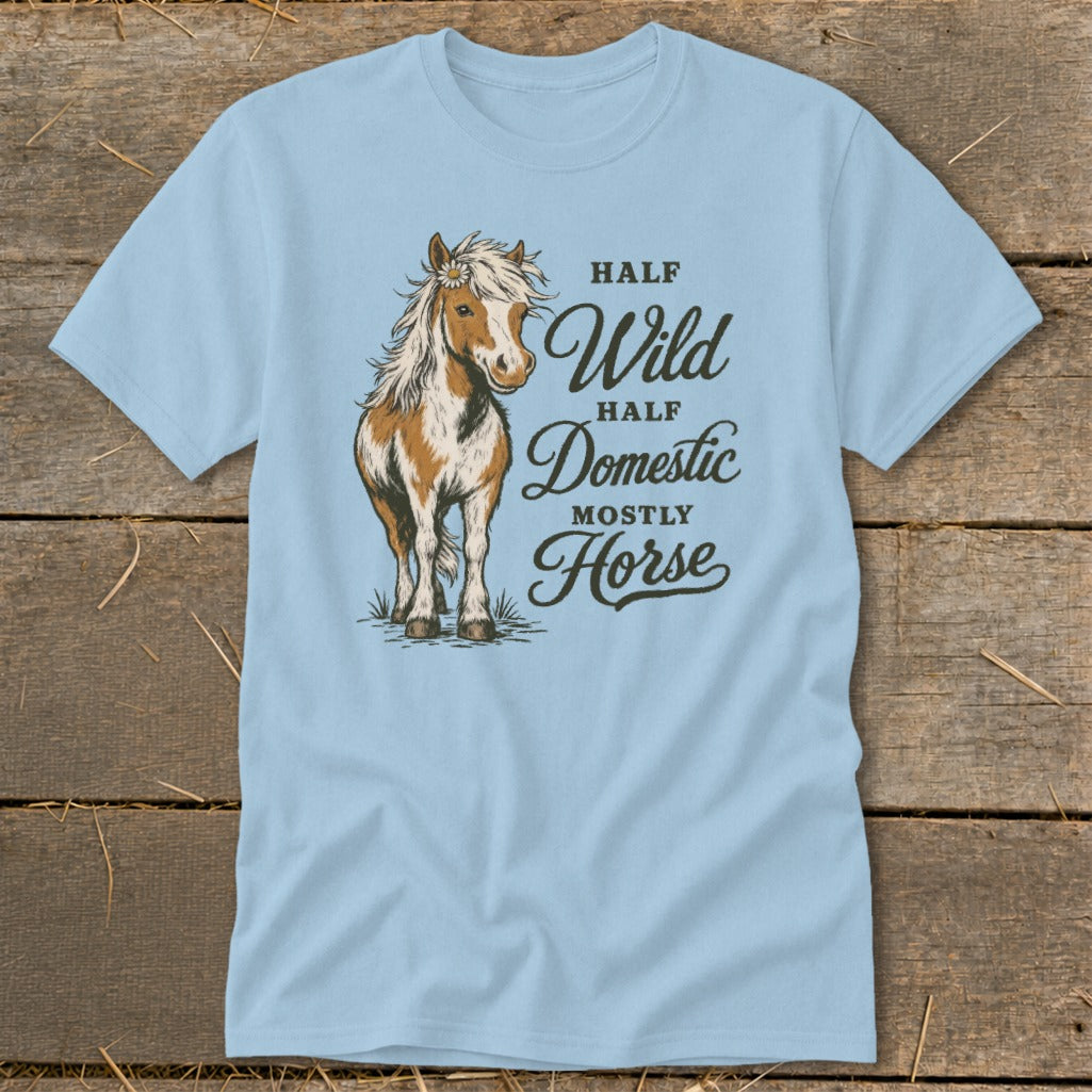 Light blue t-shirt with a drawing of a horse and text "HALF Wild HALF Domestic MOSTLY Horse".