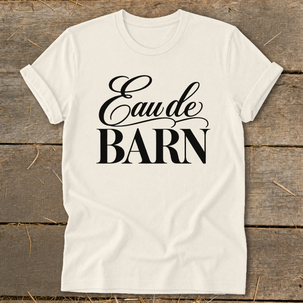 Cream t-shirt with "Eau de BARN" text in black.