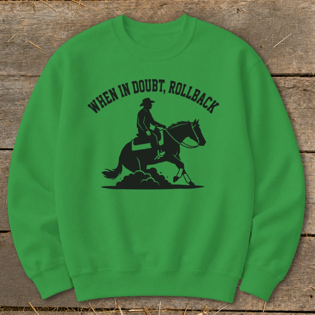 Green sweatshirt with black silhouette of a rider on a horse and text "When in doubt, rollback".