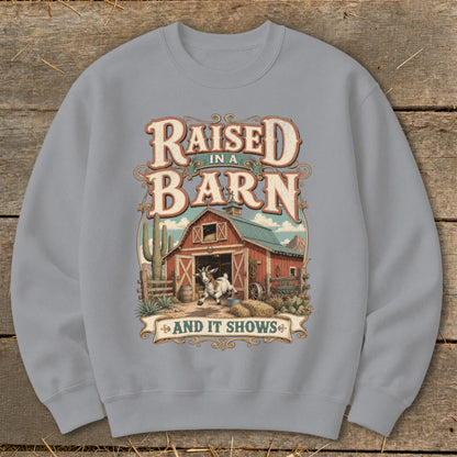 Graphic with text "Raised in a Barn and It Shows" and a goat in front of a barn.