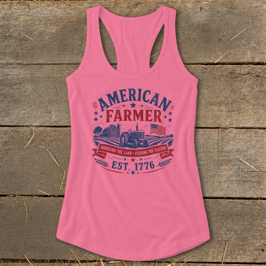 Pink tank top with "American Farmer Est. 1776" graphic featuring a tractor and barn.