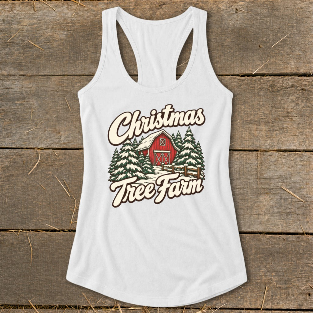 White tank top with "Christmas Tree Farm" text over a snowy barn and pine trees scene.