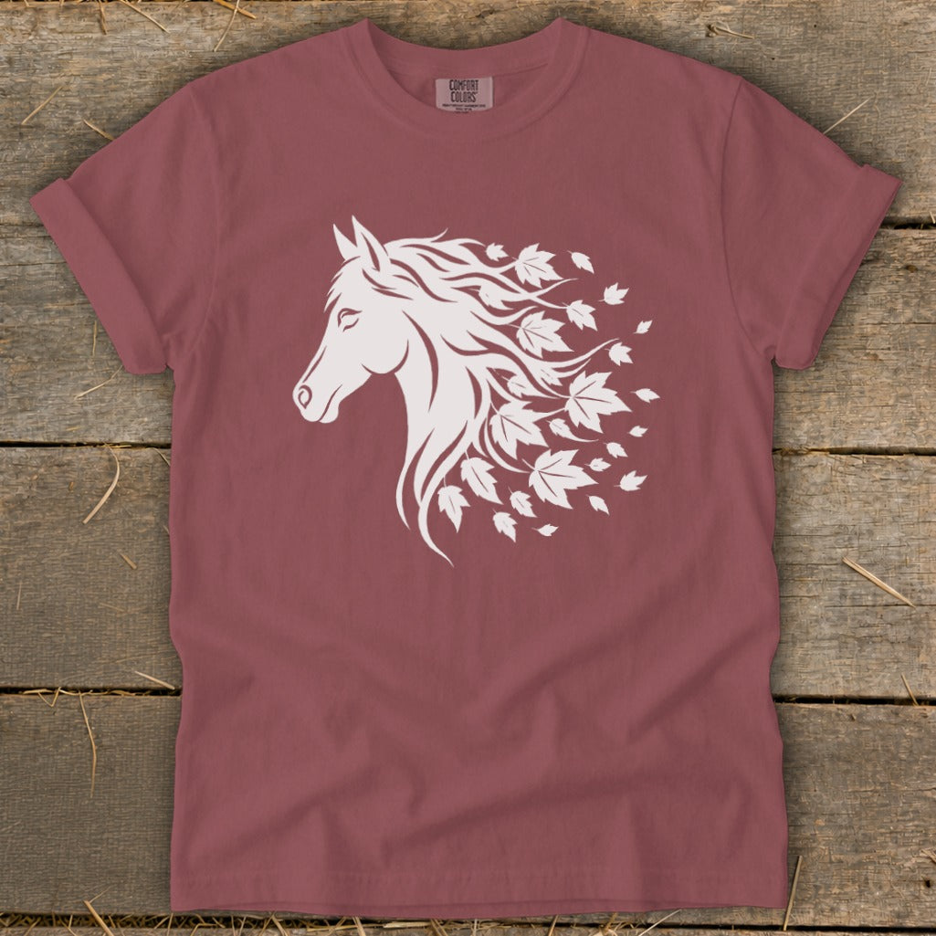 Maroon t-shirt with white horse head graphic and falling leaves.