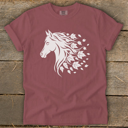 Maroon t-shirt with white horse head graphic and falling leaves.
