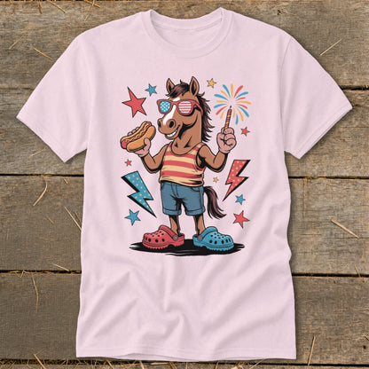 Cartoon horse wearing patriotic sunglasses, holding hot dog and sparkler, with fireworks and lightning bolts.