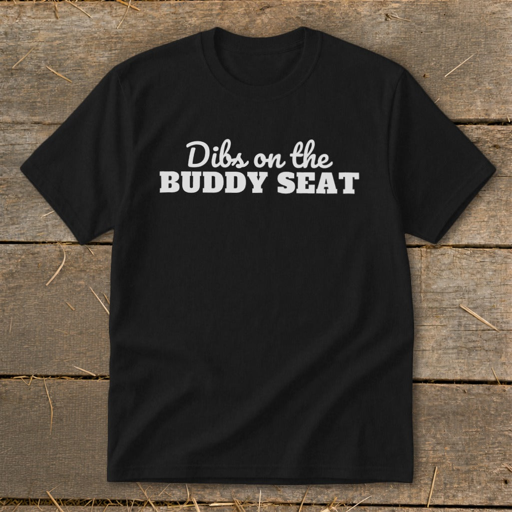 Black t-shirt with "Dibs on the BUDDY SEAT" in white text.