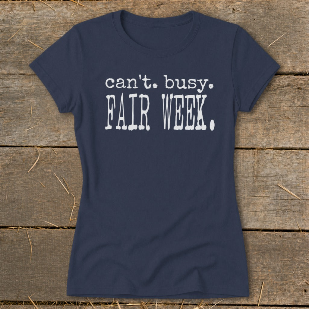 Navy t-shirt with white text reading "can't. busy. FAIR WEEK."