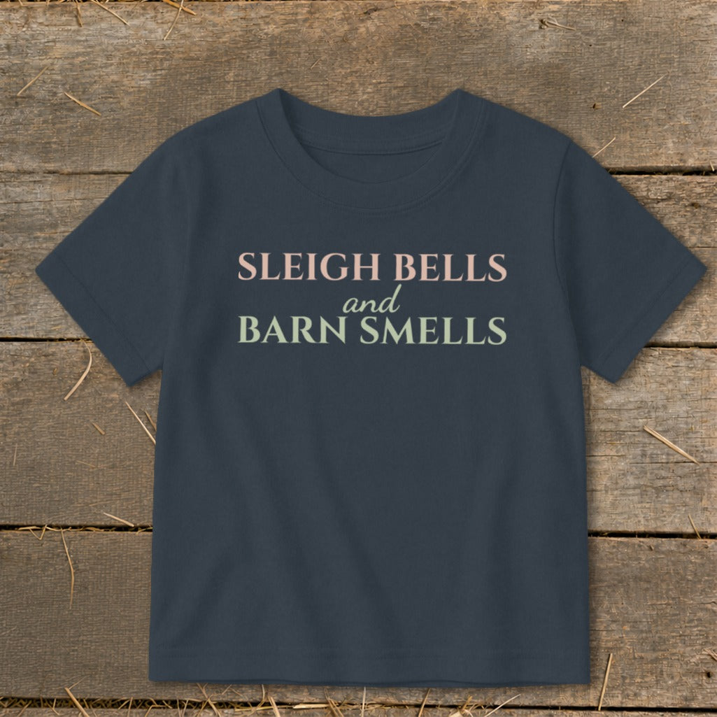 Navy t-shirt with "Sleigh Bells and Barn Smells" text.