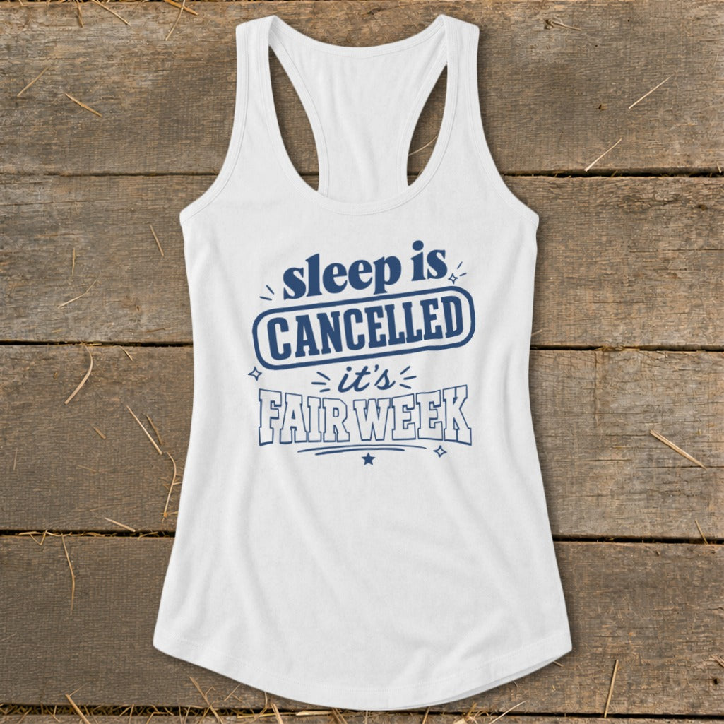 White racerback tank top with blue text "sleep is CANCELLED it's FAIR WEEK".