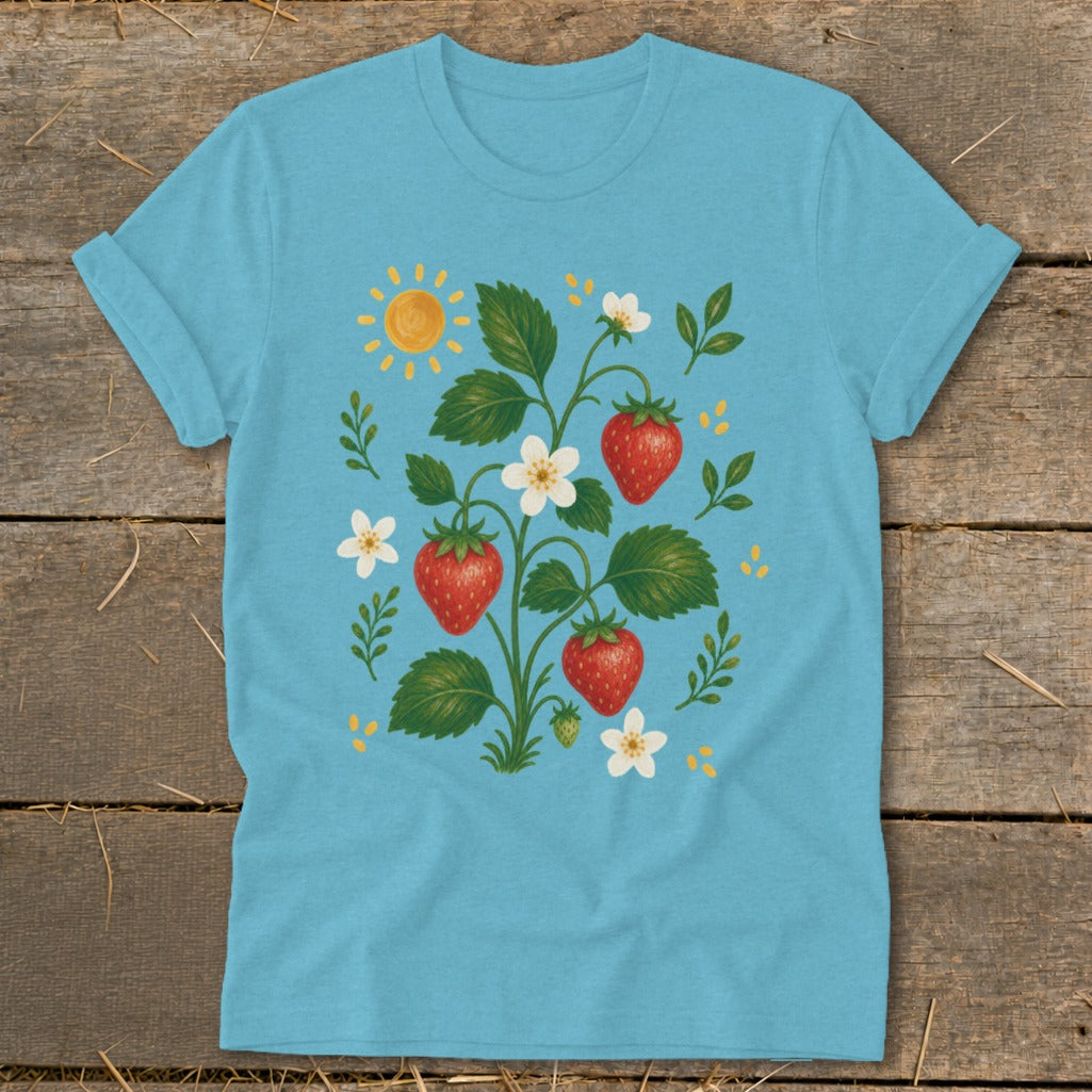 Light blue t-shirt with a vintage-style strawberry plant illustration and a smiling sun.