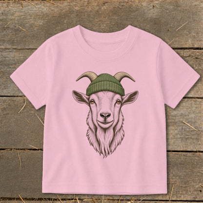 Pink t-shirt with illustration of a goat wearing a green beanie.