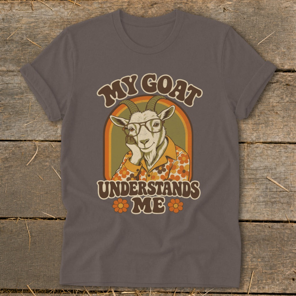 T-shirt graphic with a goat wearing glasses and shirt, text "My Goat Understands Me".