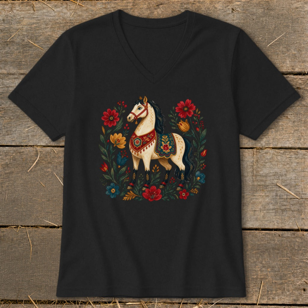 Black t-shirt with a stylized white horse in a floral border.
