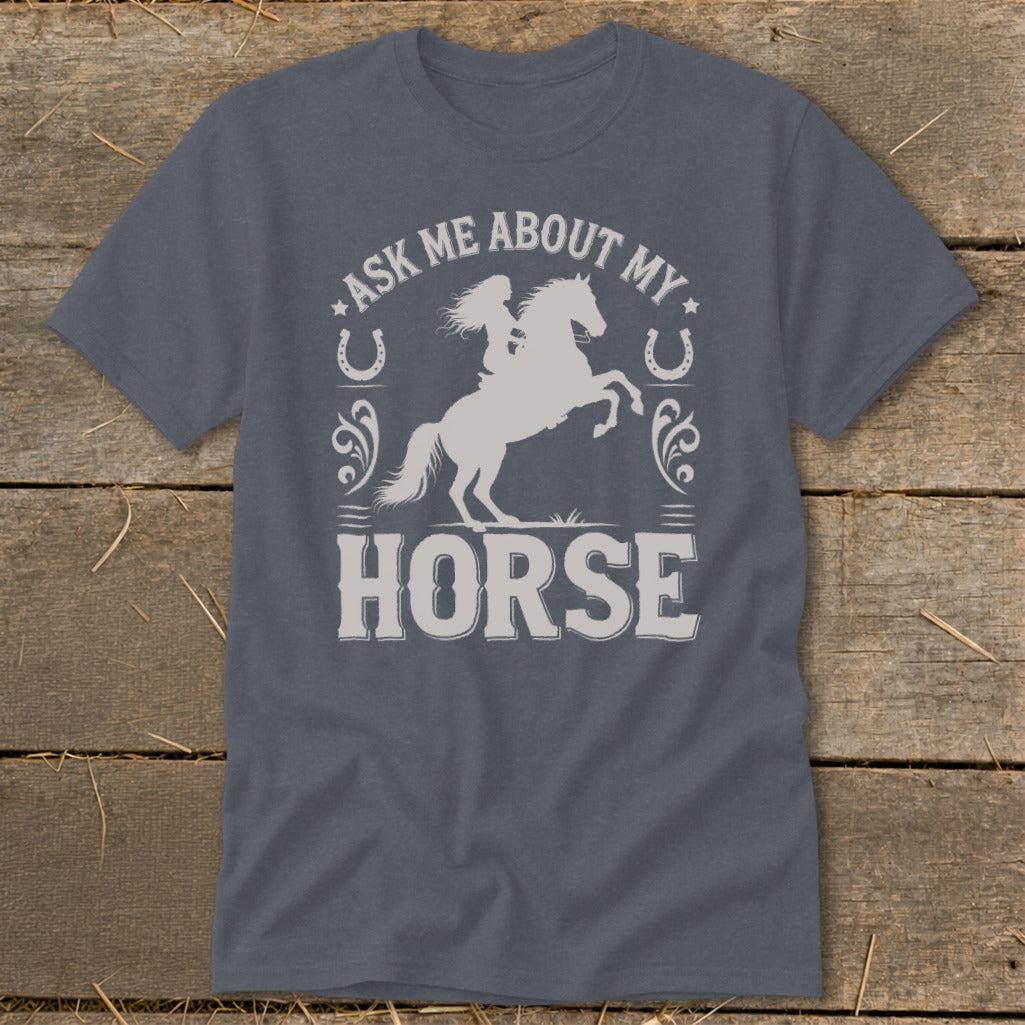"Ask me about my horse" graphic on a grey t-shirt with a horse and rider.