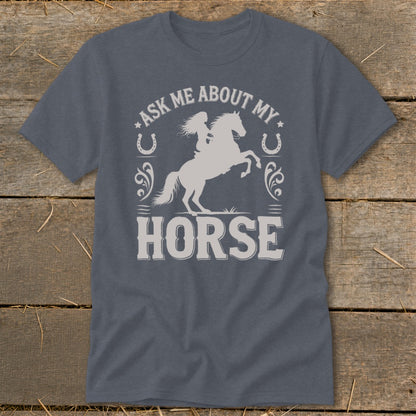 "Ask me about my horse" graphic on a grey t-shirt with a horse and rider.