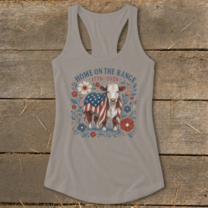 Cow wearing American flag blanket surrounded by flowers with "Home on the Range 1776-2026" text.