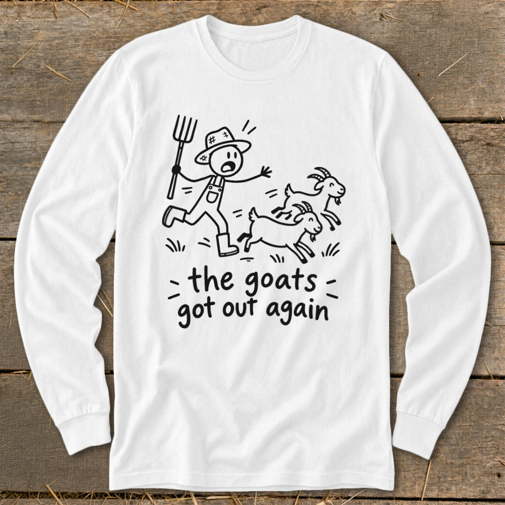 White long-sleeve shirt with a drawing of a farmer chasing goats, text reads "the goats got out again".