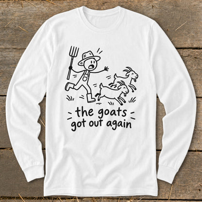 White long-sleeve shirt with a drawing of a farmer chasing goats, text reads "the goats got out again".