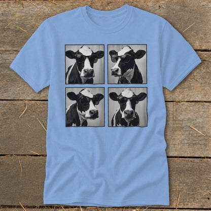 Four black and white cow portraits wearing sunglasses, arranged in a grid on a light blue t-shirt.
