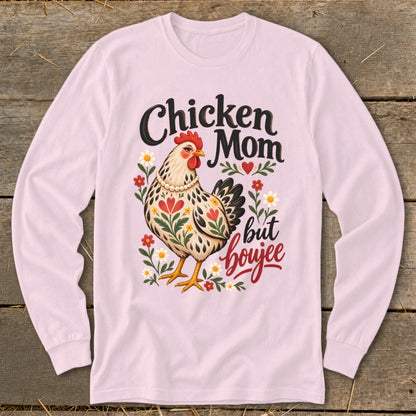 Chicken Mom but boujee graphic with a hen and floral accents on a pink shirt.