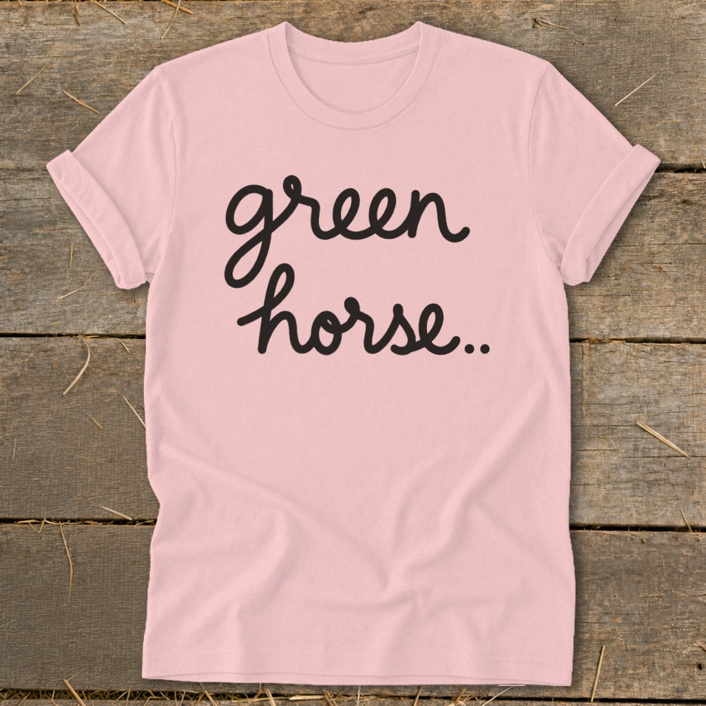Pink t-shirt with black cursive text that reads "green horse..".