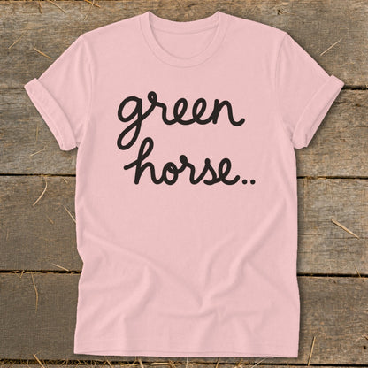 Pink t-shirt with black cursive text that reads "green horse..".