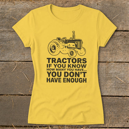 Yellow t-shirt with tractor graphic and text: "Tractors if you know how many you have... You don't have enough."