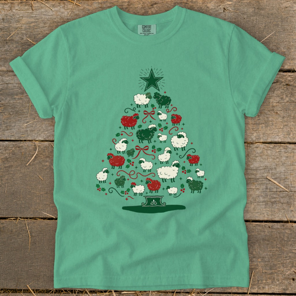 T-shirt with a Christmas tree made of white, red, and dark green sheep.
