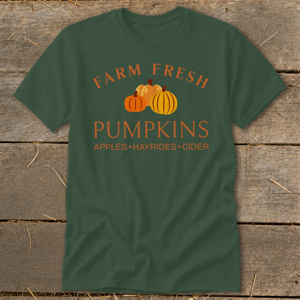 Dark green t-shirt with "Farm Fresh Pumpkins" and "Apples Hayrides Cider" text.