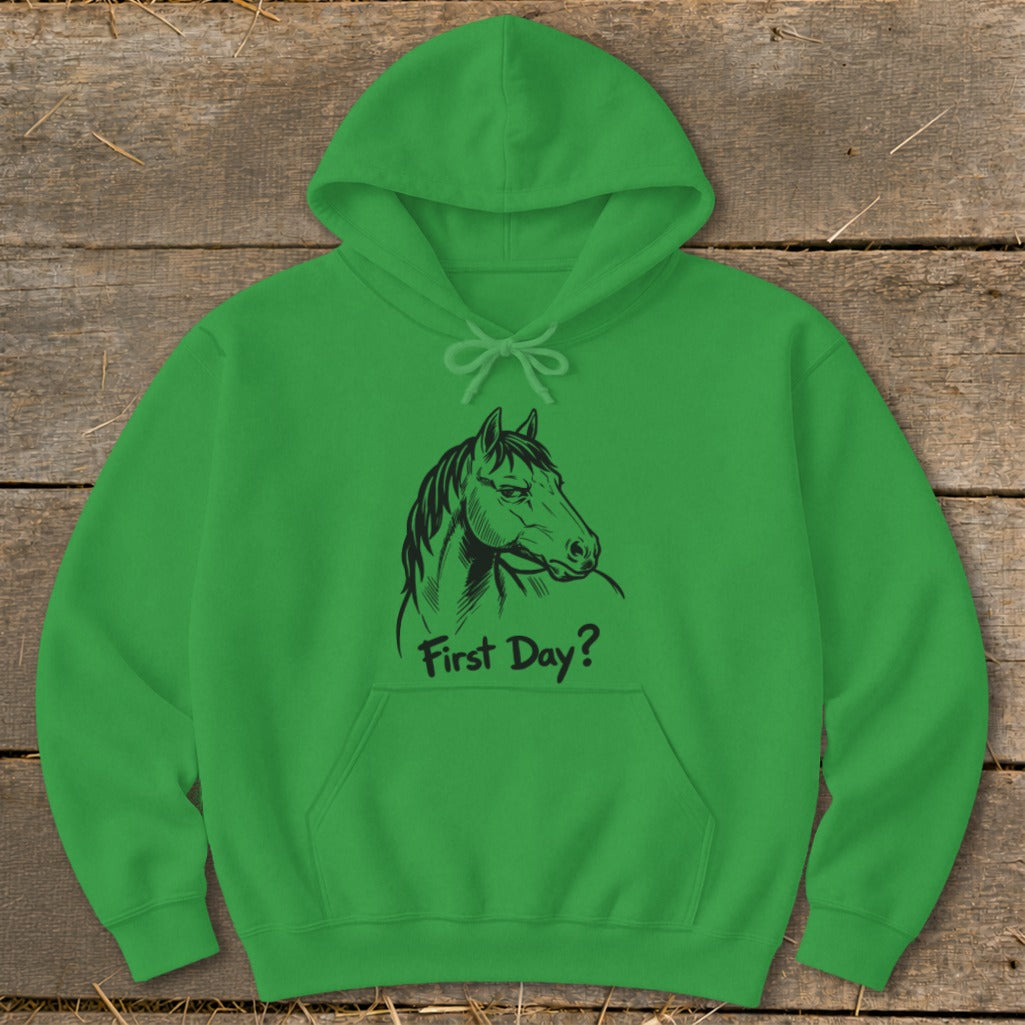 Green hoodie with black line drawing of a horse head and "First Day?" text.