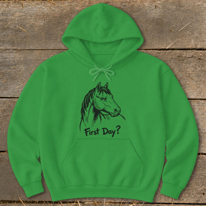 Green hoodie with black line drawing of a horse head and "First Day?" text.