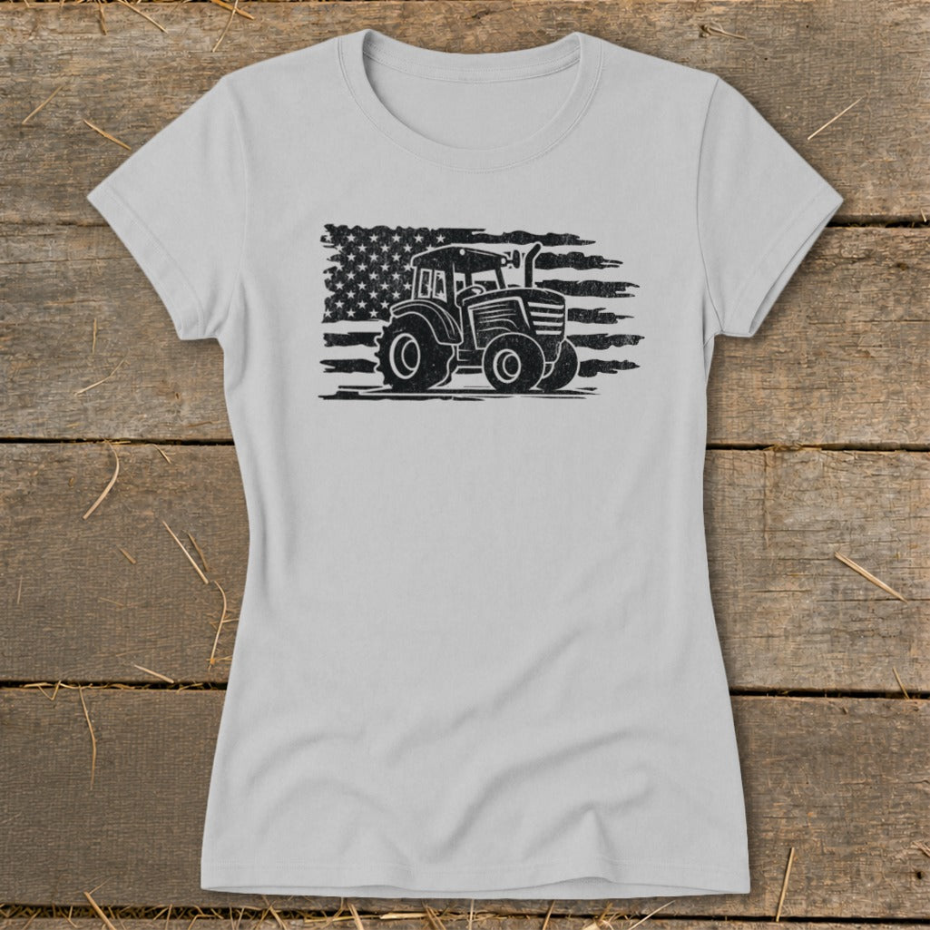 Light grey t-shirt with black graphic of a tractor in front of a distressed American flag.