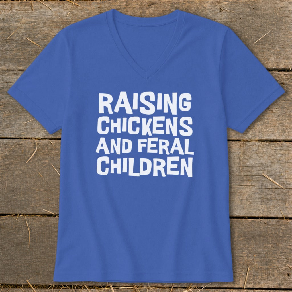 Blue V-neck t-shirt with white text reading "RAISING CHICKENS AND FERAL CHILDREN".