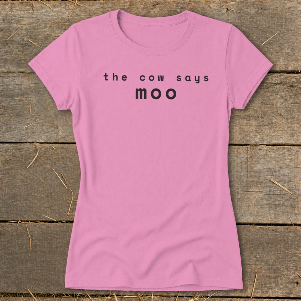 Pink t-shirt with black text that reads "the cow says moo".
