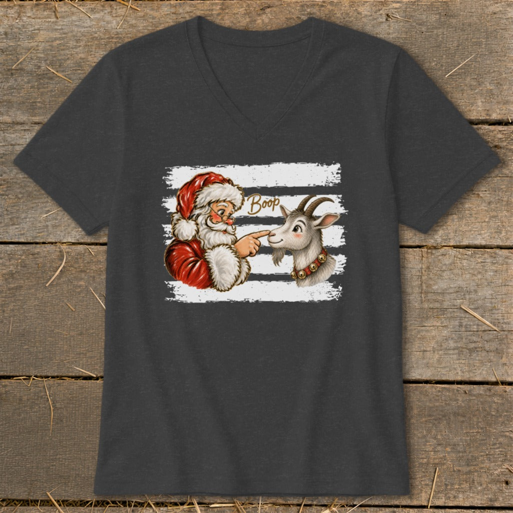 Santa's finger touches a goat's nose with "Boop" text above.