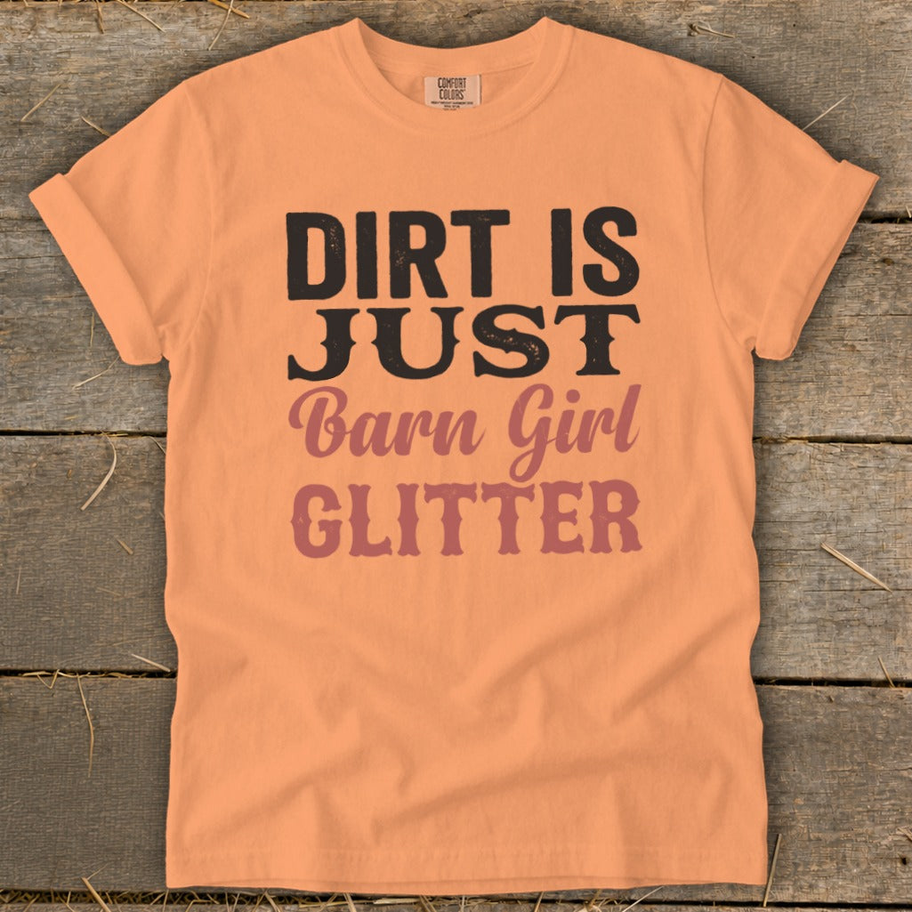 Peach t-shirt with "Dirt is Just Barn Girl Glitter" text design.