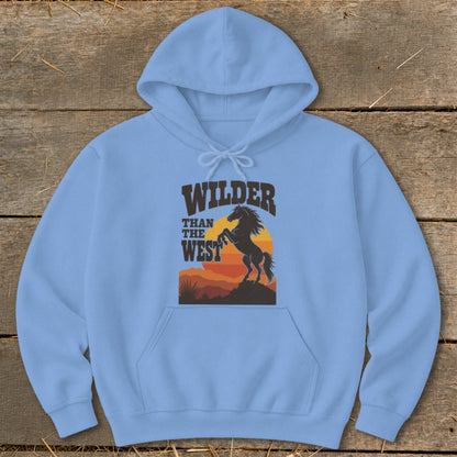 Light blue hoodie with "Wilder Than The West" text and silhouette of a rearing horse.