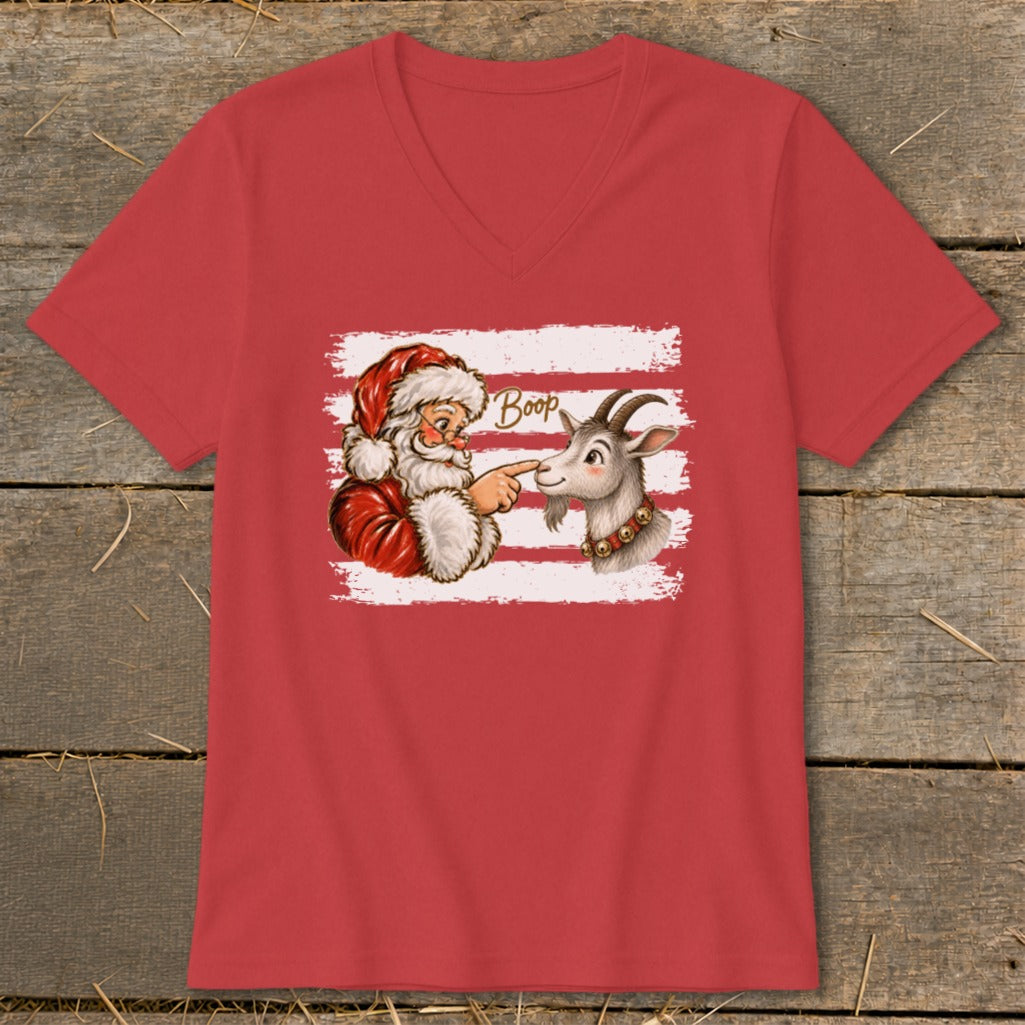 Santa booping a goat with the word "Boop" above them.