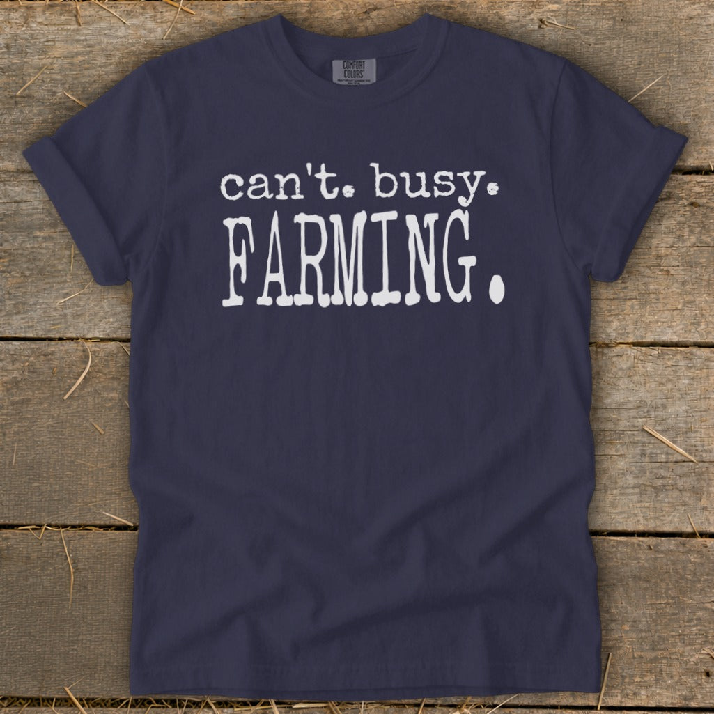 Navy t-shirt with "can't. busy. FARMING." text.
