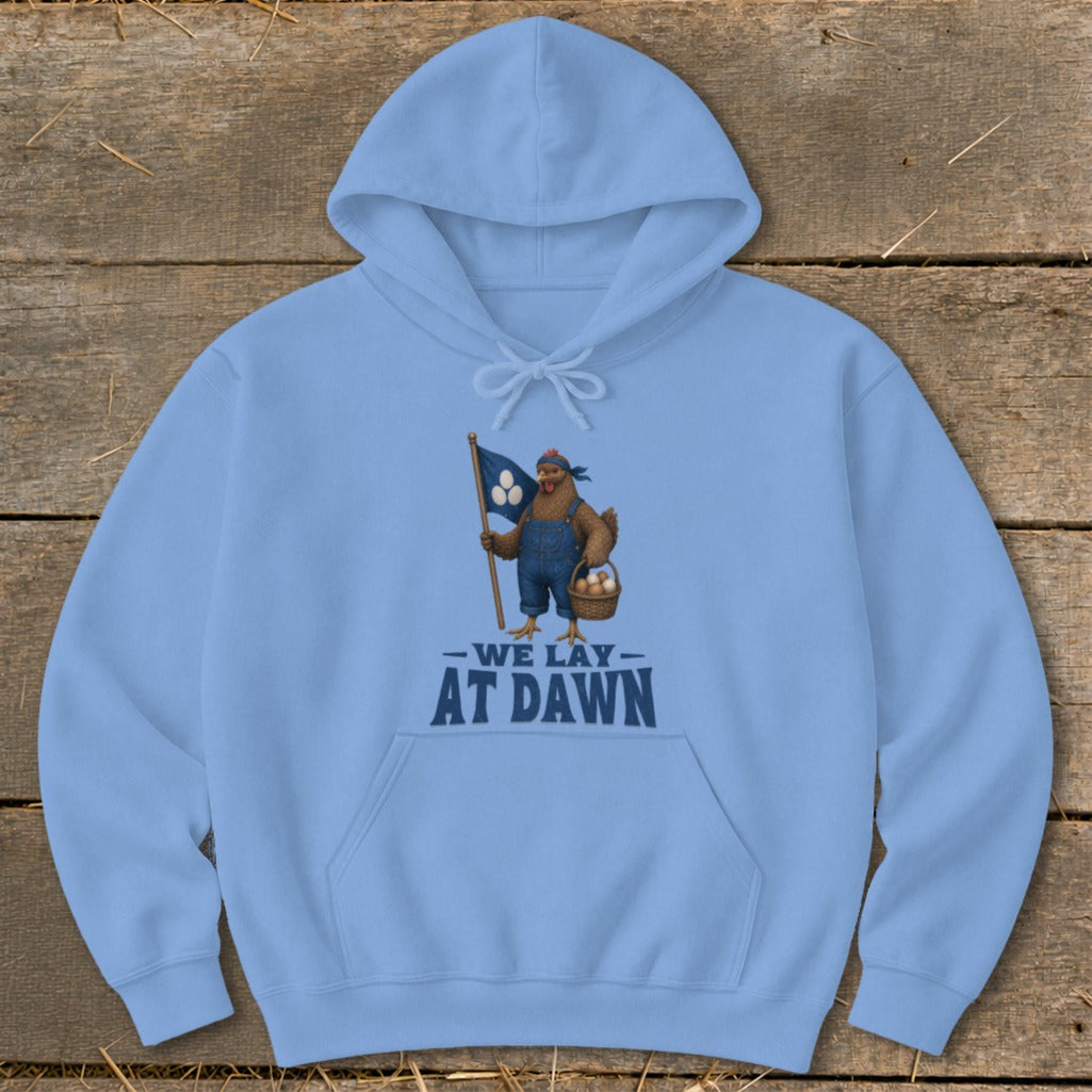 Light blue hoodie with a graphic of a chicken holding a flag and basket, reading "We Lay At Dawn".