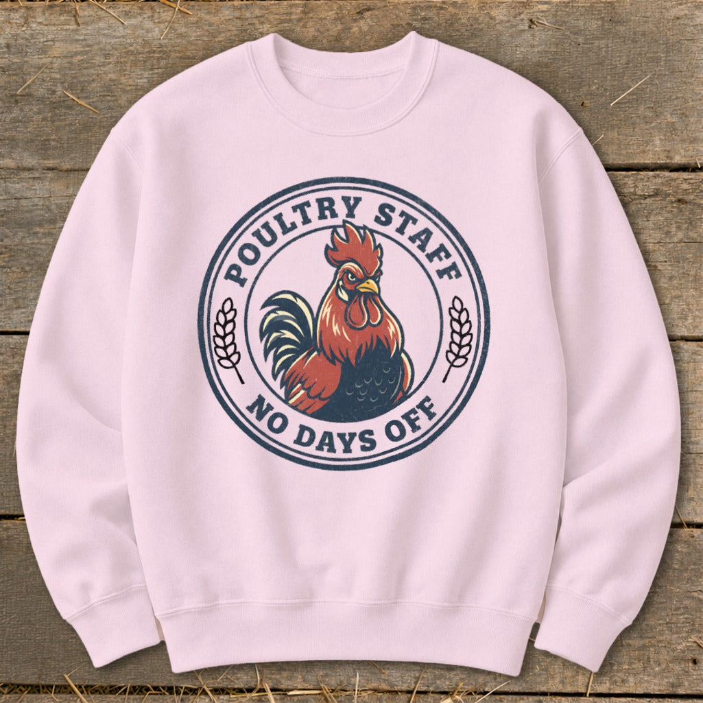 Pink sweatshirt with a circular graphic of a rooster and text "POULTRY STAFF NO DAYS OFF".