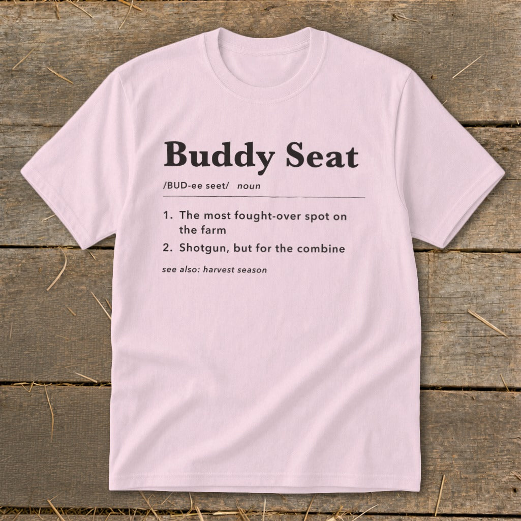 Pink t-shirt with "Buddy Seat" definition: spot on farm, shotgun for combine.