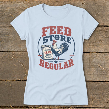 Light blue t-shirt with rooster, bag of grain, and text "Feed Store Regular".