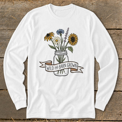 White long sleeve shirt with "Wild and Barn Grown" banner over a mason jar of wildflowers.